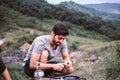 Couple lover cooking food for dinner outside tent together,Enjoying camping concept Royalty Free Stock Photo