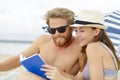 couple lover happy reading book on beach Royalty Free Stock Photo