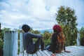 Asian couple travel photograph nature education. nature relax and study read a book. at public park. In Thailand Royalty Free Stock Photo