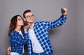 A cute young couple takes a selfie, sends an air kiss Royalty Free Stock Photo