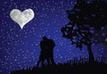 Couple of lovers kiss under the starry sky with the moon in the shape of a heart