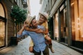 Couple of lovers kissing on city street - Two tourists enjoying romantic vacation together Royalty Free Stock Photo