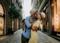 Couple of lovers kissing on city street - Two tourists enjoying romantic vacation together Royalty Free Stock Photo