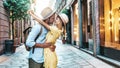 Couple of lovers kissing on city street - Two tourists enjoying romantic vacation together Royalty Free Stock Photo