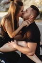 Couple of lovers kissing and hugging on motorbike Royalty Free Stock Photo