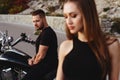 Couple of lovers kissing and hugging on motorbike Royalty Free Stock Photo