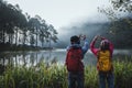 Couple lovers travel Beatiful nature at Pang ung lake and pine forest at Mae Hong Son in Thailand Royalty Free Stock Photo