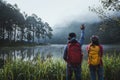 Couple lovers travel Beatiful nature at Pang ung lake and pine forest at Mae Hong Son in Thailand Royalty Free Stock Photo