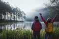 Couple lovers travel Beatiful nature at Pang ung lake and pine forest at Mae Hong Son in Thailand Royalty Free Stock Photo