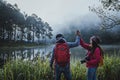 Couple lovers travel Beatiful nature at Pang ung lake and pine forest at Mae Hong Son in Thailand Royalty Free Stock Photo