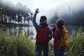 Couple lovers travel Beatiful nature at Pang ung lake and pine forest at Mae Hong Son in Thailand Royalty Free Stock Photo