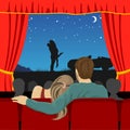 Couple of lovers watching romantic movie in cinema theater Royalty Free Stock Photo