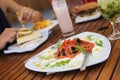 Couple lunching and drinking natural juices Royalty Free Stock Photo