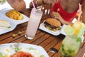 Couple lunching and drinking natural juices Royalty Free Stock Photo