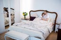 Couple lying on bed in cozy Royalty Free Stock Photo