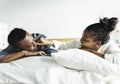 A couple lying in bed together Royalty Free Stock Photo