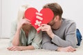 Couple Holding Red Paper Heart Fixed With Plaster Bandage