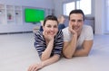 Couple lying on the floor at home Royalty Free Stock Photo