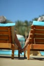 Couple lying by pool Royalty Free Stock Photo