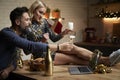 Couple make a New Year`s Eve toast during a video call