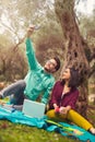 Couple make selfi under the olive tree