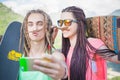 Couple make selfie on mobile phone, making mustache of hair Royalty Free Stock Photo