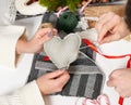 Couple making decorations for Valentine`s day, recover damaged heart, top view - romantic and love concept Royalty Free Stock Photo