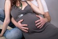 A couple making a heart shape on the pregnant belly Royalty Free Stock Photo