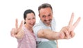 Couple making peace or victory sign Royalty Free Stock Photo