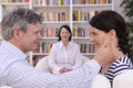 Couple making up at therapy session