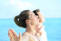 Couple making yoga on the seaside Royalty Free Stock Photo