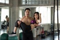 Couple man carry woman on in fitness gym Royalty Free Stock Photo