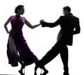 Couple man woman ballroom dancers tangoing silhouette