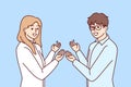 Couple man and woman in business clothes make inviting gesture with hands urging you to visit sale