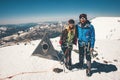 Couple Man and Woman climbing reached Elbrus mountain