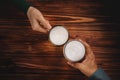 Couple of Man and Woman or Friends holding a Glass of Beer to Celebrate in Restaurant or Bar, For Oktoberfest or any Cheerful Royalty Free Stock Photo