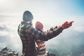 Couple Man and Woman holding hands raised on mountain summit Royalty Free Stock Photo