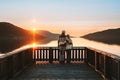 Couple man and woman hugging Valentines day family enjoying sunset lake view together travel lifestyle Royalty Free Stock Photo