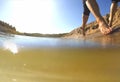 Couple man and woman running on the water wave Royalty Free Stock Photo