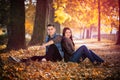 Couple man and woman sitting in the park Royalty Free Stock Photo