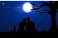 A couple man and woman sitting under tree with Moon on sky at night time Royalty Free Stock Photo