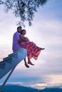 couple man and woman on stairway in the sky, Ladder Way to Heaven isolated on sky Royalty Free Stock Photo