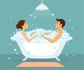 Couple, man and woman taking bath in a vintage bathtub with bubbles Royalty Free Stock Photo