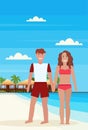 Couple man woman on tropical island with villa bungalow hotel on beach seaside green palms landscape summer vacation