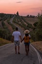 couple man and woman on vacation in Toscane Italy, man and woman mid age visiting Toscany region on the golden hills Royalty Free Stock Photo