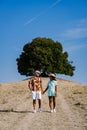 couple man and woman on vacation in Toscane Italy, man and woman mid age visiting Toscany region on the golden hills Royalty Free Stock Photo