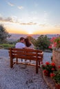 couple man and woman on vacation in Toscane Italy, man and woman mid age visiting Toscany region on the golden hills Royalty Free Stock Photo