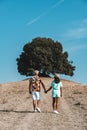 couple man and woman on vacation in Toscane Italy, man and woman mid age visiting Toscany region on the golden hills Royalty Free Stock Photo