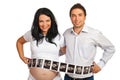 Couple with many sonogram images Royalty Free Stock Photo