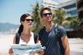 Couple, map and search with journey on vacation, street and excited for giving direction. Woman, man and chart for Royalty Free Stock Photo